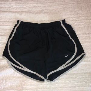 Black and white Nike running shorts